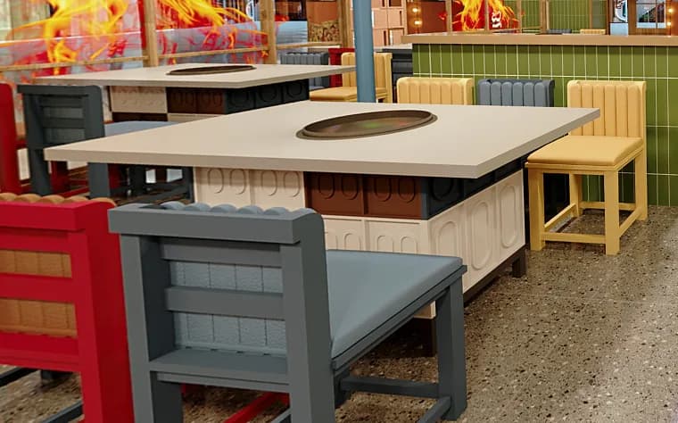 Mesas con parrilla integrada y sillas de madera de colores